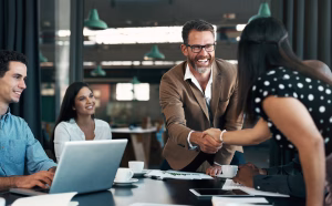 Business people meeting and handshake for deal
