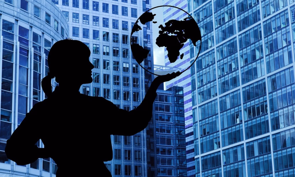 Person holding a globe